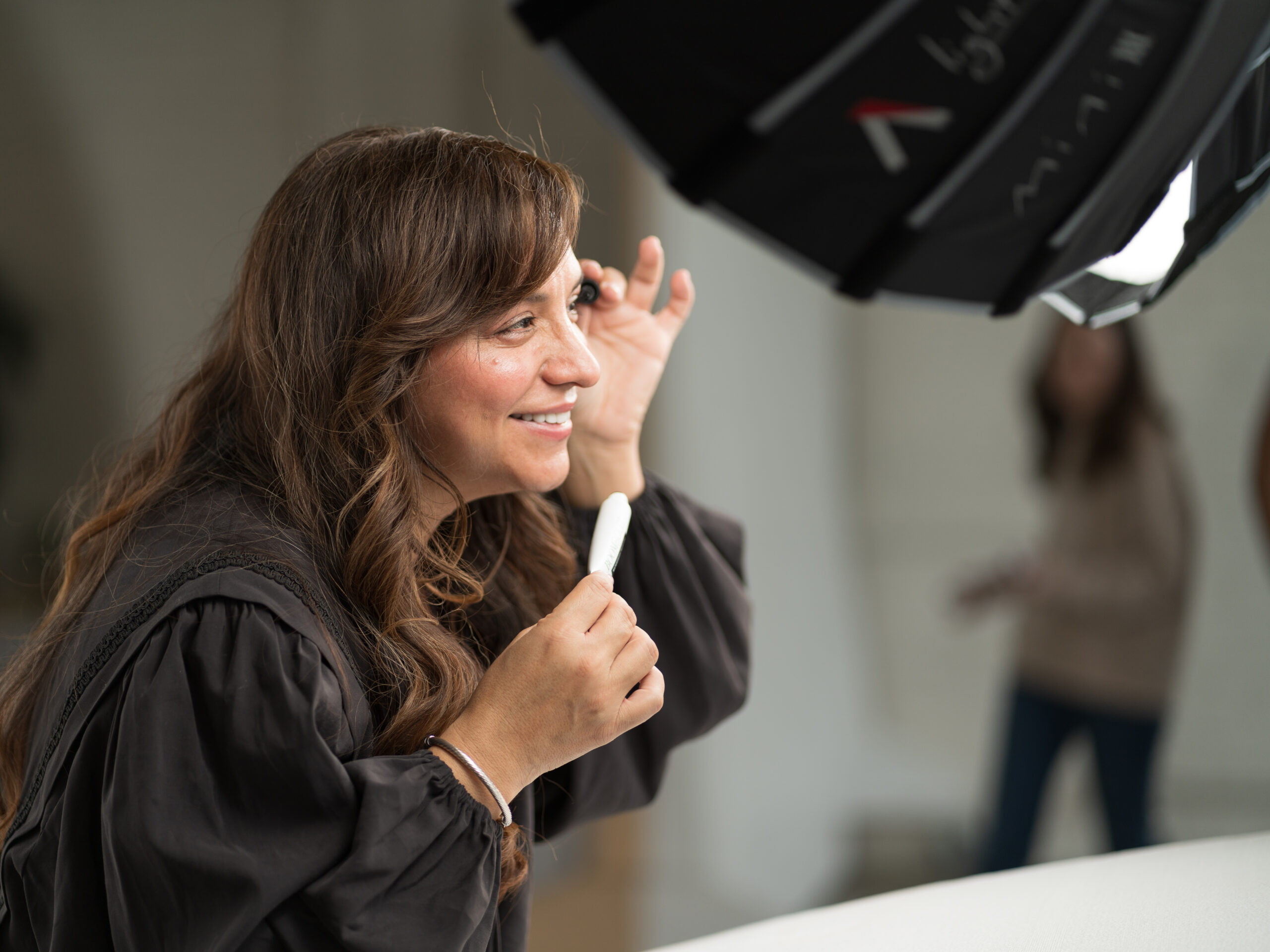 A woman being photographed